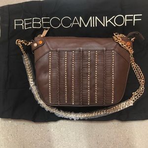 Rebecca Minkoff handbag with gold chain.